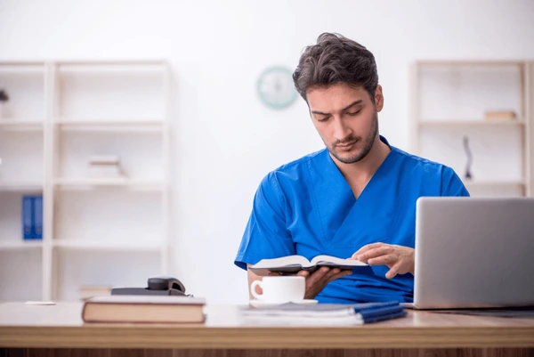 Student studying with laptop